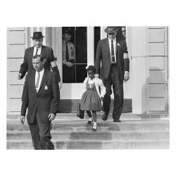 Ruby Bridges - First African-American child in Louisiana autorised to go to an all-white public school protected by US_Marshals 