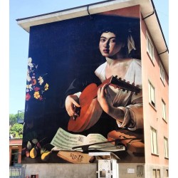 Andrea Ravo Mattoni -  mural inspired from Suonatore di Liuto by Caravaggio 1596_pa_stre_http!++www.ravo.art