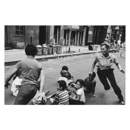 Leonard Freed - Policewoman playing with children in Harlem NYC - 1978 